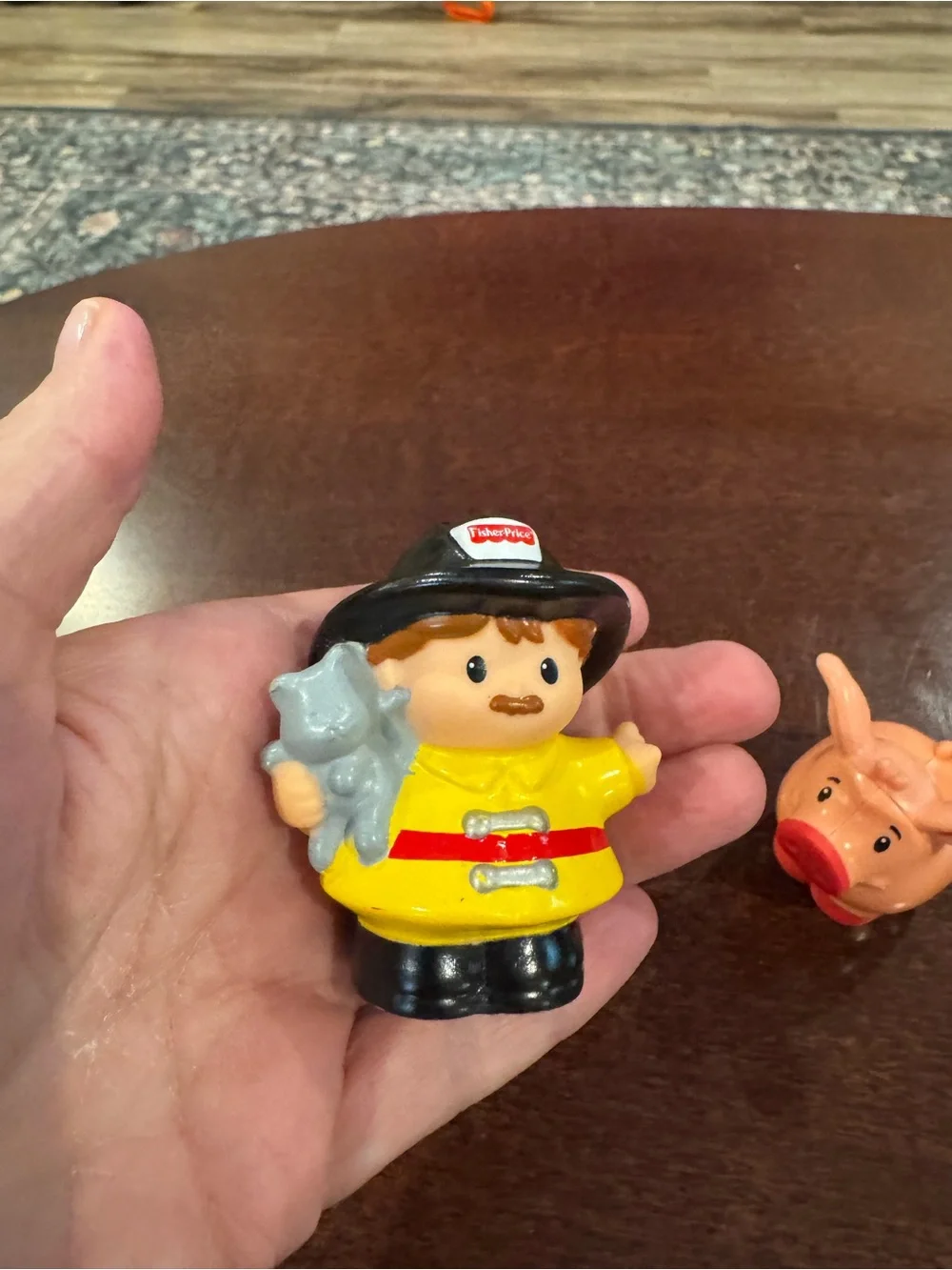 Fisher-Price Yellow Firefighter with Cat Figure with Black Hat and Red Belt 2009